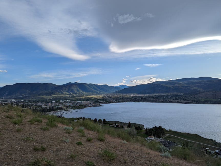 Okanagan Weed cannabis product with scenic Okanagan Valley backdrop