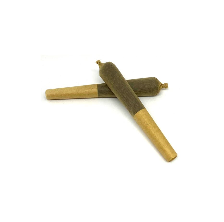 Hash pre-rolls displayed in a row showing twisted paper cone joints filled with cannabis hash