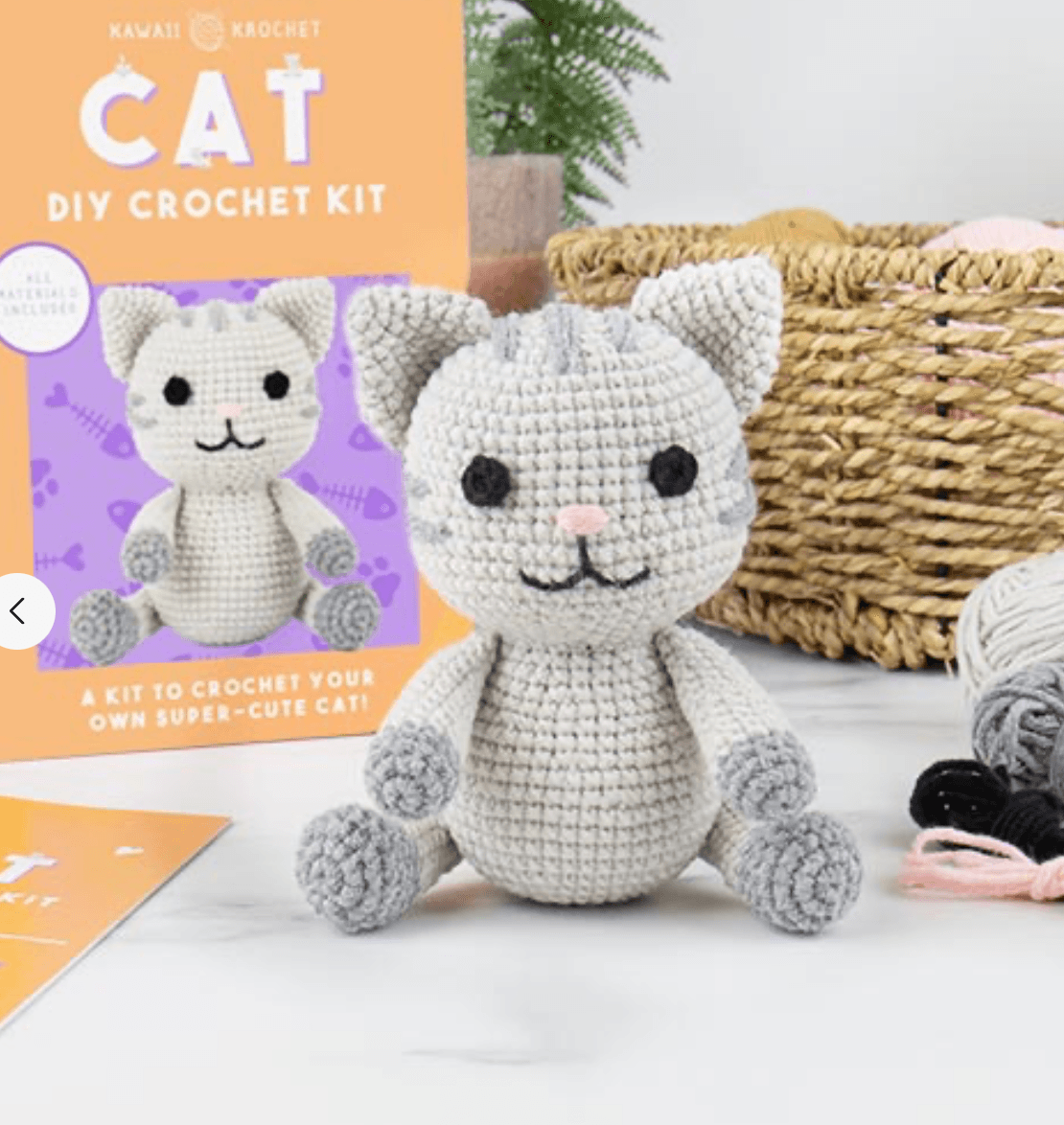 Kawaii DIY crochet cat craft kit with cute supplies and pattern for making an adorable handmade plush kitten